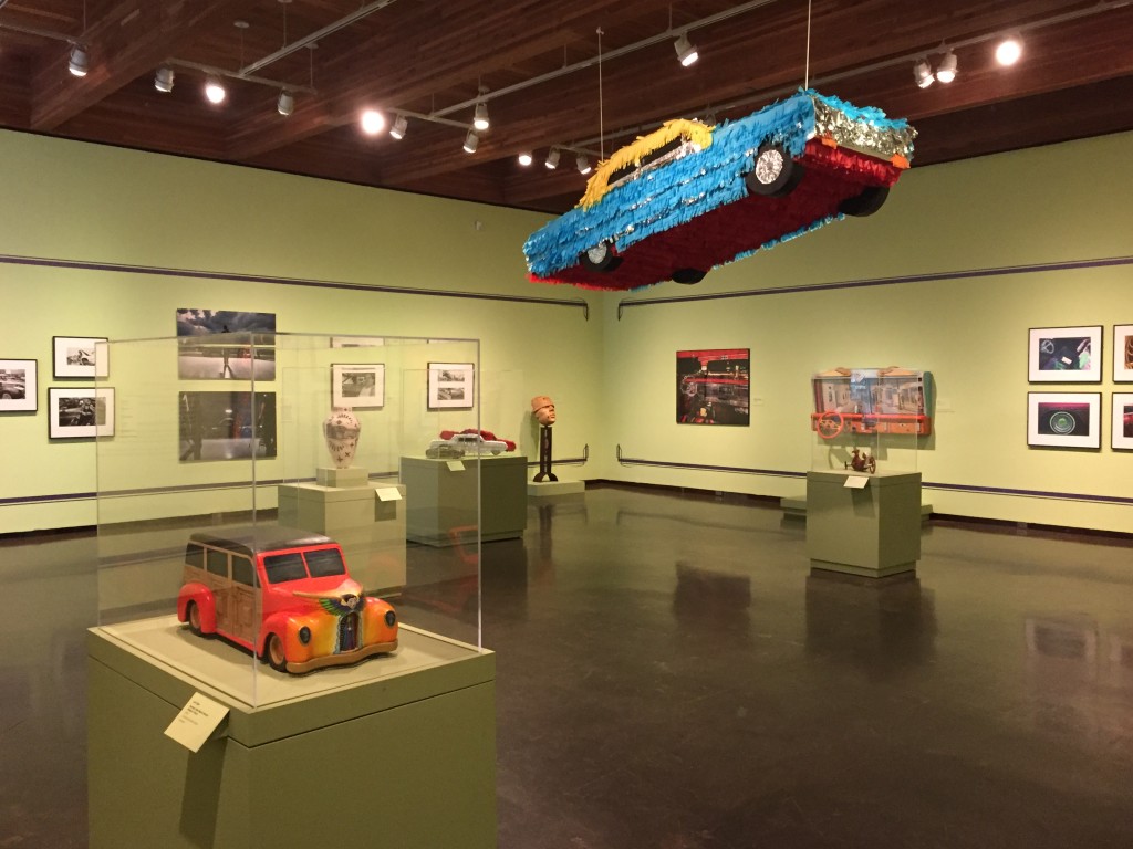 “Con Cariño: Artists Inspired by Lowriders” continues through Oct. 10 at the New Mexico Museum of Art. From piñatas to colorful woodcarvings, ceramic pieces, photographs and paintings, the exhibit features all things lowrider.